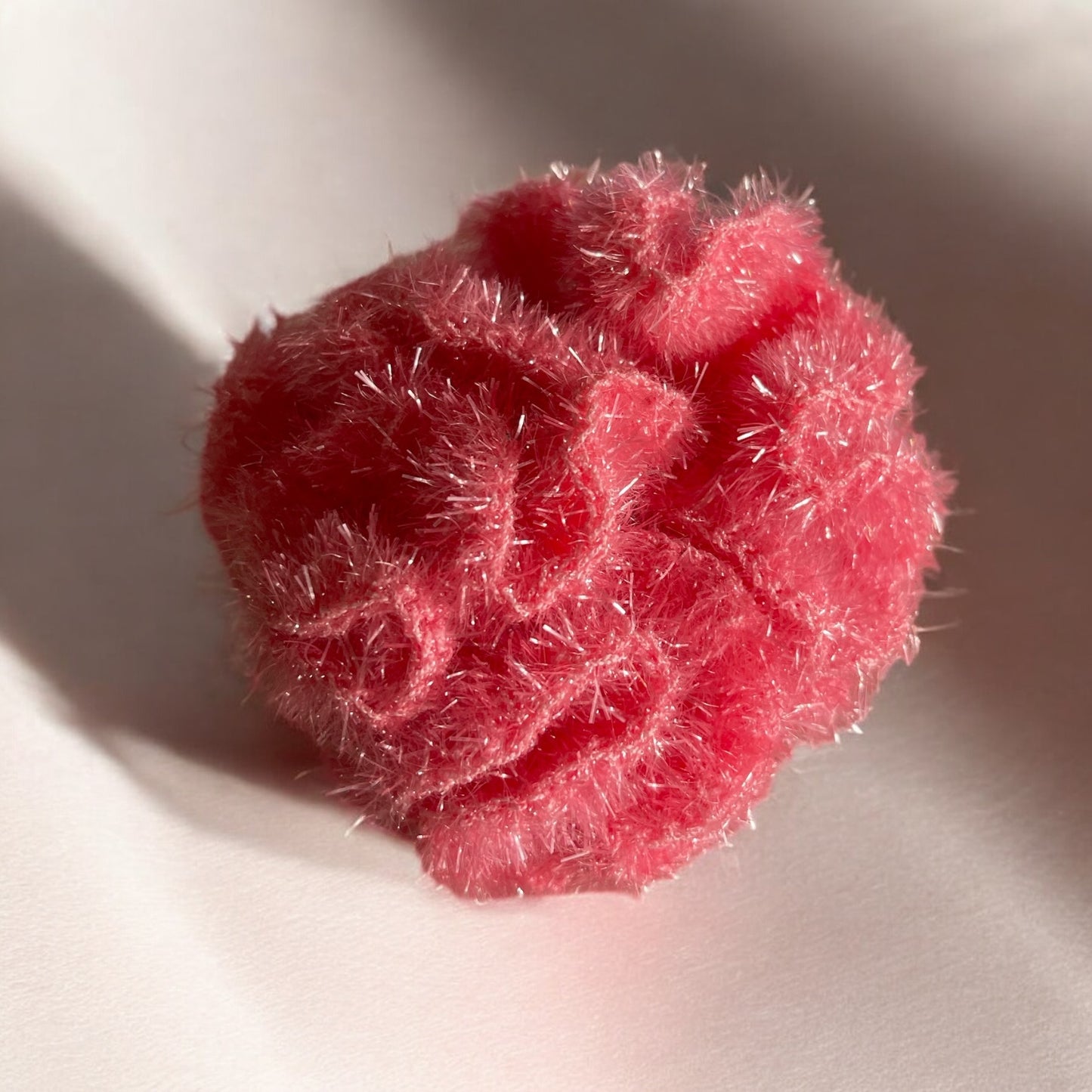 Fleur de douche exfoliente